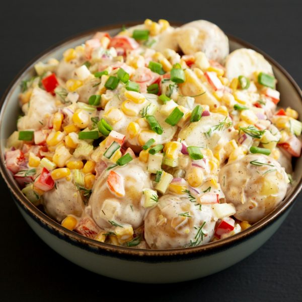 Homemade Summer Potato Salad in a Bowl, side view.